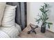 Cozy bedroom detail showcasing tasteful decor, soft bedding, and natural light at 3527 101St E Ave, Parrish, FL 34219