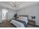Bedroom featuring a ceiling fan, carpeted floors and en suite at 3527 101St E Ave, Parrish, FL 34219
