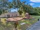 A community playground featuring swings and play equipment in a well-maintained grassy area at 3527 101St E Ave, Parrish, FL 34219
