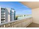 Relaxing balcony view overlooking the ocean, bridge and scenic coastline under clear blue skies at 450 Treasure Island Cswy # 505, Treasure Island, FL 33706