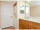 Bathroom with laundry machines, double sink vanity and lots of lighting at 450 Treasure Island Cswy # 505, Treasure Island, FL 33706