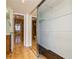 Spacious closet with mirrored sliding doors next to a full bathroom at 450 Treasure Island Cswy # 505, Treasure Island, FL 33706