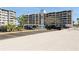 Ample parking spaces available in the exterior parking lot for residents and visitors at 450 Treasure Island Cswy # 505, Treasure Island, FL 33706