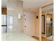 Compact kitchen area with stainless steel refrigerator and ample counter space at 450 Treasure Island Cswy # 505, Treasure Island, FL 33706