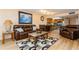 Spacious living room with open layout and kitchen and dining area in the background at 450 Treasure Island Cswy # 505, Treasure Island, FL 33706