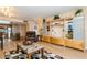 Open concept living room featuring custom shelving and a cozy seating area at 450 Treasure Island Cswy # 505, Treasure Island, FL 33706