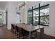 Dining room showcasing large windows, stylish lighting, and an elegant dining table at 5009 W Longfellow Ave, Tampa, FL 33629