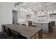 View of the kitchen and dining area featuring stainless steel appliances, and an open layout at 5009 W Longfellow Ave, Tampa, FL 33629
