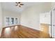 Spacious bedroom with a ceiling fan and access to the backyard at 501 Sportsman Park Dr, Seffner, FL 33584