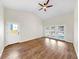 Bright bedroom with a ceiling fan and access to the backyard at 501 Sportsman Park Dr, Seffner, FL 33584