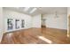 Bright living room featuring hardwood floors, skylights, and glass patio doors at 501 Sportsman Park Dr, Seffner, FL 33584
