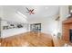 Bright living room boasts white counters, skylight and fireplace with screened in patio view at 501 Sportsman Park Dr, Seffner, FL 33584