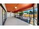 This screened patio features a terracotta ceiling and a clear view to the landscaped backyard at 501 Sportsman Park Dr, Seffner, FL 33584