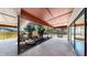 This screened patio has a terra cotta ceiling and beautiful views to the backyard at 501 Sportsman Park Dr, Seffner, FL 33584