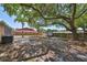 Expansive backyard featuring mature trees providing lots of shade and a storage shed at 601 Cedar Grove Dr, Brandon, FL 33511