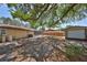 Expansive backyard featuring mature trees providing lots of shade and a storage shed at 601 Cedar Grove Dr, Brandon, FL 33511