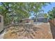 Expansive backyard featuring mature trees providing lots of shade and a screened in pool at 601 Cedar Grove Dr, Brandon, FL 33511