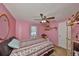 Cozy bedroom with carpet, ceiling fan and natural light from the window at 601 Cedar Grove Dr, Brandon, FL 33511