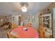 Inviting dining room with traditional furnishings, decor, and a charming china cabinet display at 601 Cedar Grove Dr, Brandon, FL 33511