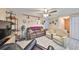 This open-concept living space offers tile floors and recessed ceiling lights at 601 Cedar Grove Dr, Brandon, FL 33511
