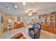 Inviting living room with a piano, tile flooring, and ample natural light at 601 Cedar Grove Dr, Brandon, FL 33511