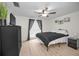 Bedroom featuring ceiling fan, natural light, and contemporary decor at 613 Valley Hill Dr, Brandon, FL 33510
