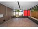 Enclosed patio featuring tile flooring and ample natural light, ideal for outdoor living at 613 Valley Hill Dr, Brandon, FL 33510
