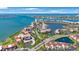 Beautiful aerial view of waterfront condos, meticulously landscaped grounds, and stunning ocean views at 6357 Bahia Del Mar Blvd # 111, St Petersburg, FL 33715