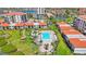 Aerial shot of pool area with ample lounge seating and stunning views of the surrounding landscape at 6357 Bahia Del Mar Blvd # 111, St Petersburg, FL 33715