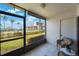 Balcony view to pool area, ocean, palm trees, and building exterior at 6357 Bahia Del Mar Blvd # 111, St Petersburg, FL 33715