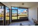 This tiled balcony has views of pool, manicured lawn and ocean beyond at 6357 Bahia Del Mar Blvd # 111, St Petersburg, FL 33715