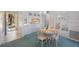 Charming dining area adjacent to the kitchen, perfect for casual meals and entertaining at 6357 Bahia Del Mar Blvd # 111, St Petersburg, FL 33715