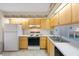 Bright kitchen featuring ample cabinet space, essential appliances, and a functional layout at 6357 Bahia Del Mar Blvd # 111, St Petersburg, FL 33715