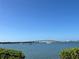 Picturesque water view featuring a bridge, boats, and clear blue skies at 6357 Bahia Del Mar Blvd # 111, St Petersburg, FL 33715