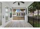 This screened porch offers a relaxing space to enjoy the outdoors with a view of the yard at 7113 S Kissimmee St, Tampa, FL 33616