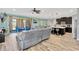 An open floor plan combining the kitchen and the living room for a welcoming atmosphere at 7502 Sea Lilly Ct, Apollo Beach, FL 33572