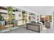 Enclosed patio featuring cozy seating, ceiling fans, and lush greenery, creating a serene outdoor retreat at 865 Live Oak Ne Ter, St Petersburg, FL 33703