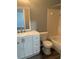 Clean bathroom with a white vanity, a framed mirror, and a combined shower and tub at 9501 Lake Park Dr # 9501, Thonotosassa, FL 33592