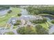 Aerial view of the pool and golf course at Tampa Bay Golf & Country Club at 9823 Rolling Cir, San Antonio, FL 33576