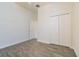 Bedroom with ample closet space, neutral paint, and hard surface floors at 9823 Rolling Cir, San Antonio, FL 33576