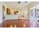 Spacious open floorplan seamlessly connecting the living room to the kitchen and dining area at 9823 Rolling Cir, San Antonio, FL 33576