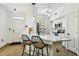 Modern kitchen with sleek countertops, stainless steel appliances, and stylish bar seating, perfect for entertaining at 9828 Lake Chase Island Way # 0, Tampa, FL 33626