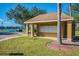 Community mailbox structure on a sunny day, by the lake, with ample parking at 9828 Lake Chase Island Way # 0, Tampa, FL 33626