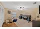 Charming bedroom with a comfortable armchair and a playful loft bed design at 1007 Morfield Ln, Brandon, FL 33511