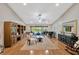 Spacious living room with pool view and elegant hardwood floors at 1007 Morfield Ln, Brandon, FL 33511