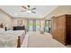 Serene main bedroom with pool views, neutral decor, and ample natural light at 1007 Morfield Ln, Brandon, FL 33511