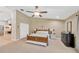 Spacious main bedroom with a ceiling fan and walk-in closet at 1007 Morfield Ln, Brandon, FL 33511
