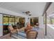 Covered patio with comfortable seating and a view of the pool at 1007 Morfield Ln, Brandon, FL 33511