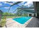 Relaxing screened-in pool area with outdoor seating and well-maintained brick pavers at 1007 Morfield Ln, Brandon, FL 33511