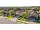 Charming single-Gathering home with well-manicured landscaping, a brick driveway, and a two-car garage at 10450 Highland Park Pl, Palmetto, FL 34221